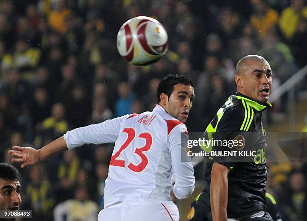 Lille's Adil Rami eyes the ball with Fenerbahce's Bilica from Brazil during their UEFA Europa League football match at Sukru Saracoglu stadium in...