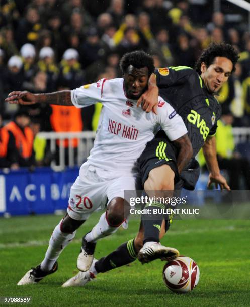 Lille's Larsen Toure fights for the ball with Fenerbahce's Deniz Baris during their UEFA Europa League football match at Sukru Saracoglu stadium in...