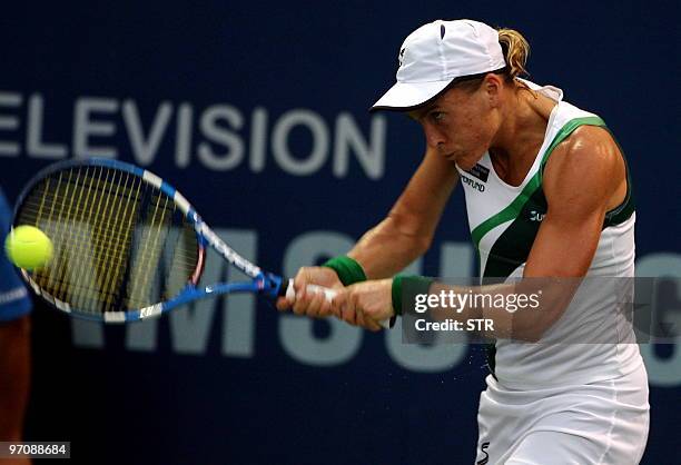 Sybille Bammer of Australia hits a return to Kai Chen Chang of Taiwan during their quarter-final match of the WTA Malaysian Open 2010 Tennis...