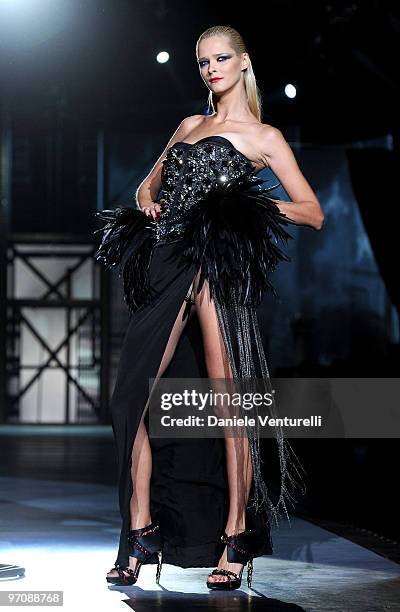 Model Carmen Kass walks the runway during the DSquared2 Milan Fashion Week Autumn/Winter 2010 show on February 26, 2010 in Milan, Italy.