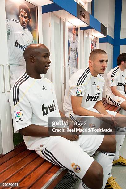 Lass Diarra and Karim Benzema of Real Madrid pose in a replica of the bernabeu dressing room during a special video shooting on February 10, 2010 in...