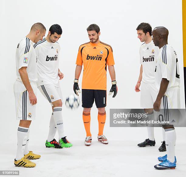 Karim Benzema, Raul Albiol, Iker Casillas, Gonzalo Higuain and Lass Diarra of Real Madrid kick de ball around during a special video shooting on...
