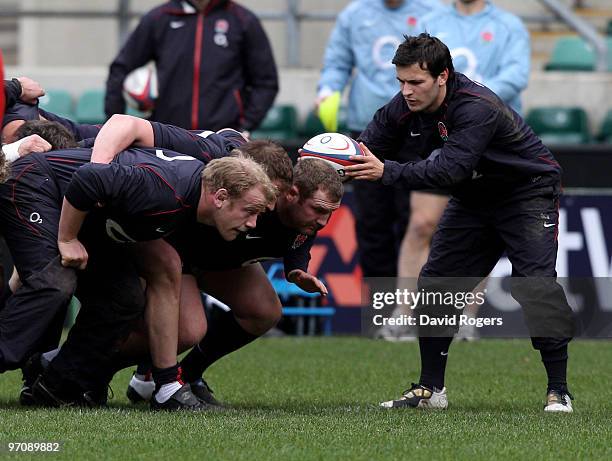 Danny Care, the England scrumhalf prepares to feed in the ball to the England front row during the England training session held at Twickenham...