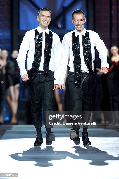 Designer Dean and Dan Caten walk the runway after the DSquared2 Milan Fashion Week Autumn/Winter 2010 show on February 26, 2010 in Milan, Italy.
