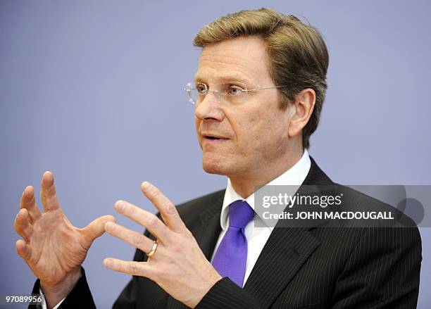 German Foreign Minister and vice-chancellor Guido Westerwelle addresses a press conference on Germany's Afghanistan policy in Berlin February 26,...