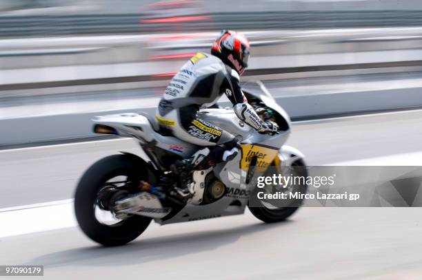 Hiroshi Aoyama of Japan and Interwetten MotoGP Team heads down a straight during testing at Sepang Circuit on February 26, 2010 in Kuala Lumpur,...