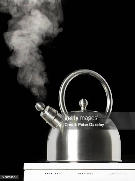 boiling kettle with copy space on hob - boiling steam stock pictures, royalty-free photos & images