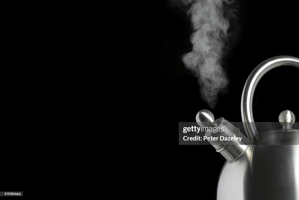 Close up of boiling kettle with copy space
