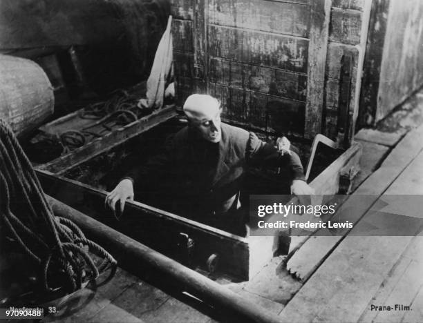 German actor Max Schreck , as the vampire Count Orlok, emerges onto the deck of the Demeter, in a scene from F. W. Murnau's expressionist horror...