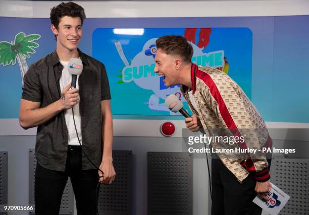 Shawn Mendes and Roman Kemp in the on air studio during Capital's Summertime Ball with Vodafone at Wembley Stadium, London. PRESS ASSOCIATION Photo....