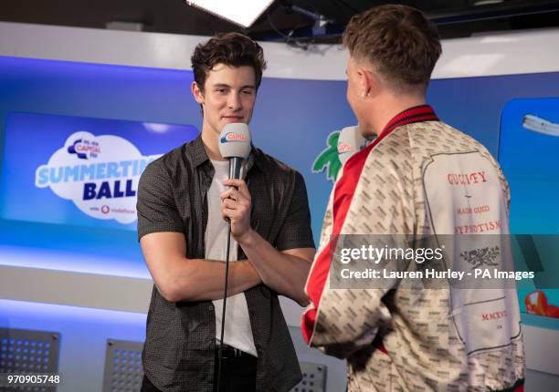 Shawn Mendes and Roman Kemp in the on air studio during Capital's Summertime Ball with Vodafone at Wembley Stadium, London. PRESS ASSOCIATION Photo....