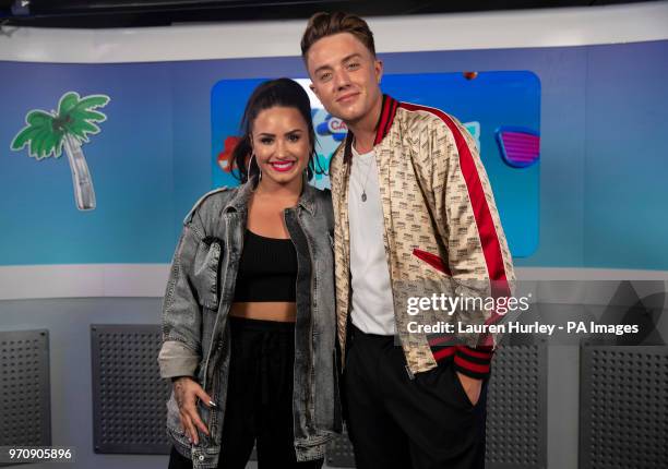 Demi Lovato and Roman Kemp in the on air studio during Capital's Summertime Ball with Vodafone at Wembley Stadium, London. PRESS ASSOCIATION Photo....