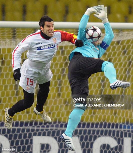 Alvaro Negredo of Sevilla attacks goalkeeper Igor Akinfeev of CSKA in Moscow on February 24, 2010 during their last 16 round UEFA Champions League...