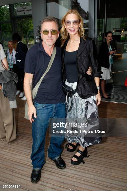 Actor Tim Roth and his wife Nikki Butler attend the Men Final of the 2018 French Open - Day Fithteen at Roland Garros on June 10, 2018 in Paris,...