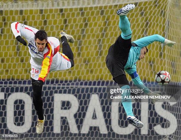 Alvaro Negredo of Sevilla fights for the ball with goalkeeper Igor Akinfeev of CSKA in Moscow on February 24, 2010 during their last 16 round UEFA...