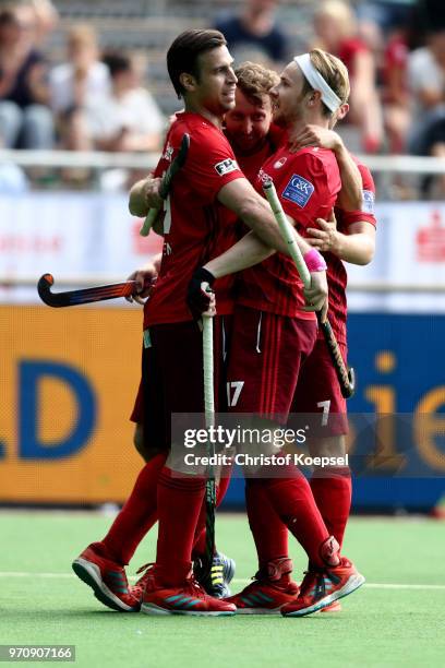 Jan Fleckhaus of Rot-Weiss Koeln celebrates the second goal with Christopher Zeller and Christopher Ruehr during the mens final match between...