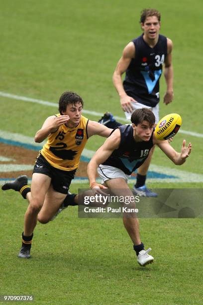 Jordan Clark of WA tackles Xavier O'Halloran of VIC metro during the 2018 NAB AFL Under-18 Championships match between Western Australia and Vic...