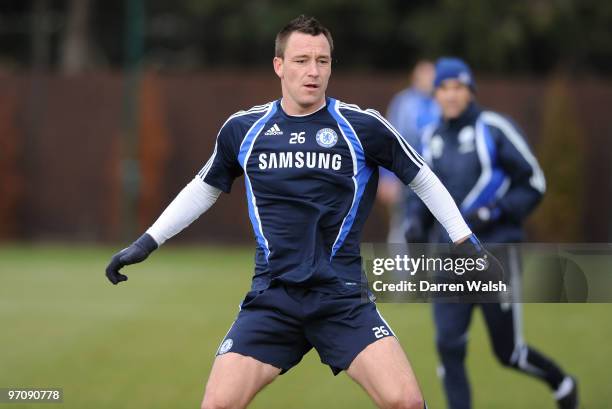 John Terry of Chelsea in action during a training session at the Cobham training ground on February 26, 2010 in Cobham, England.