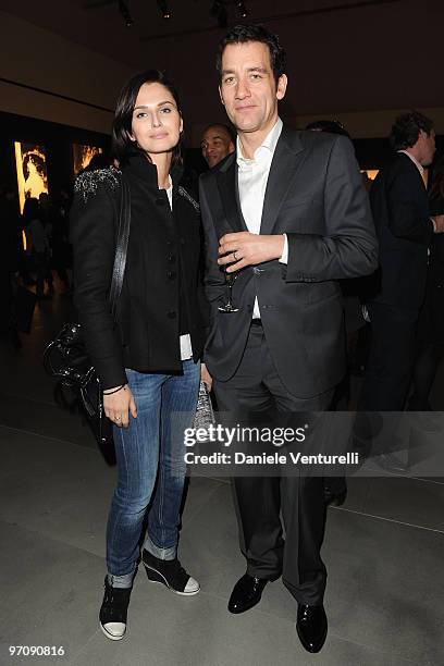 Anna Safroncik and Clive Owen attend Richard Hambleton Exhibition during Milan Fashion Week Womenswear Autumn/Winter 2010 show on February 25, 2010...