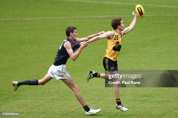 Thomas Hallebone of VIC metro and Luke Foley of WA contest for the ball during the 2018 NAB AFL Under-18 Championships match between Western...