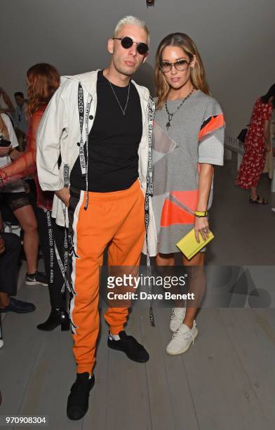 Example and Erin McNaught attend the Christopher Raeburn show during London Fashion Week Men's June 2018 at the BFC Show Space on June 10, 2018 in...