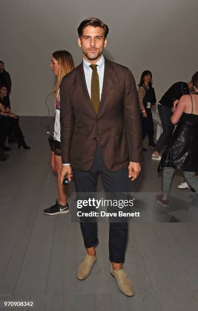 Johannes Huebl attends the Christopher Raeburn show during London Fashion Week Men's June 2018 at the BFC Show Space on June 10, 2018 in London,...