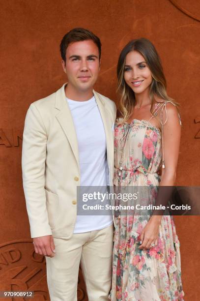 Football player Mario Gotze and his companion Ann-Kathrin Brommel attend the Men Final of the 2018 French Open - Day Fifteen at Roland Garros on June...