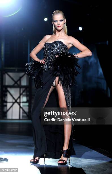 Model Carmen Kass walks the runway during the DSquared2 Milan Fashion Week Autumn/Winter 2010 show on February 26, 2010 in Milan, Italy.