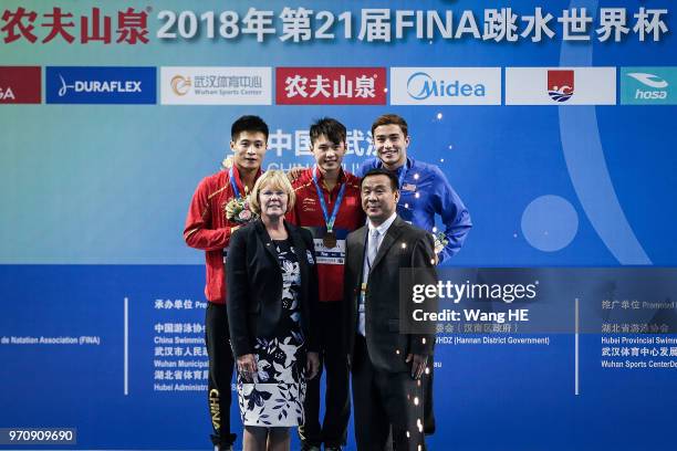 Silver medallist Yang Jian of China of China,gold medallist Chen Aisen of China and bronze medallist David Dinsmore of USA during the medal ceremony...