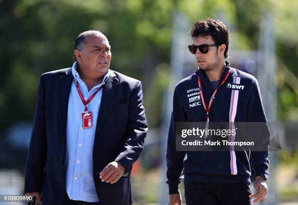 Sergio Perez of Mexico and Force India arrives at the circuit with father Antonio Perez before the Canadian Formula One Grand Prix at Circuit Gilles...