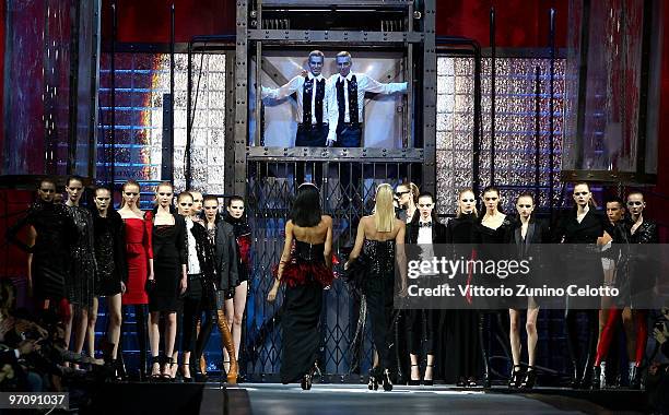 Designers Dean and Dan Caten walk the runway during the DSquared2 Milan Fashion Week Autumn/Winter 2010 show on February 26, 2010 in Milan, Italy.