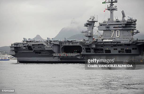 The USS Carl Vinson Nimitz class aircraft supercarrier arrives at Guanabara Bay in Rio de Janeiro, Brazil, on February 26 comming from Haiti after...