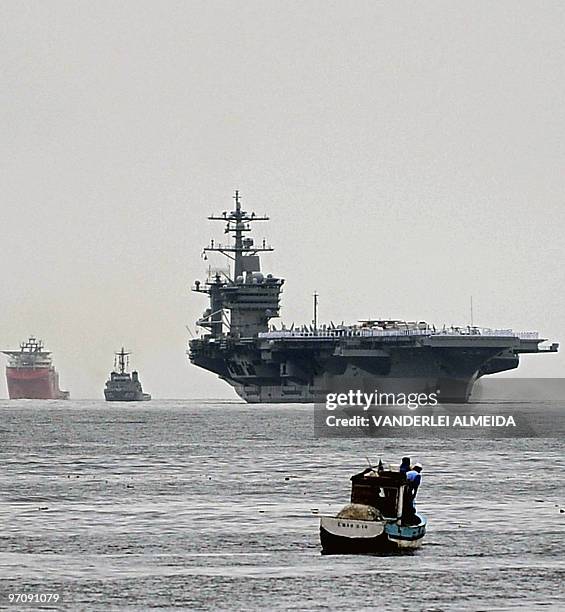 The USS Carl Vinson Nimitz class aircraft supercarrier arrives at Guanabara Bay in Rio de Janeiro, Brazil, on February 26 comming from Haiti after...