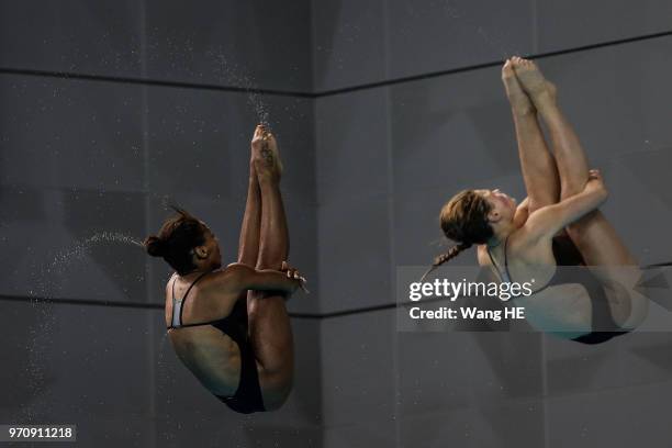 Jennifer Abel and Melissa Citrini Benulieu of Canada compete in the women's 3m Synchro Springboard final on FINA Diving World Cup 2018 at the Wuhan...
