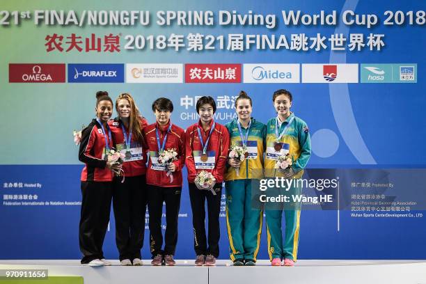 Silver medallist Jennifer Abel and Melissa Citrini Benulieu of Canada ,gold medallist Chang yangni and Shi Tingmao of China and bronze medallist...