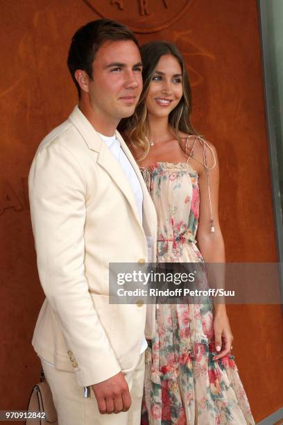 German Football player Mario Gotze and his companion Ann Kathrin Brommel attend the Men Final of the 2018 French Open - Day Fithteen at Roland Garros...