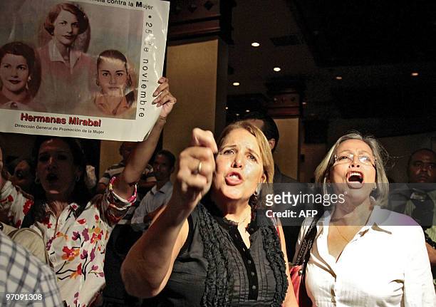 People gather shouting slogans against late Dominican Republic dictator Rafael Trujillo outside a hotel in Santo Domingo on February 25, 2010 during...
