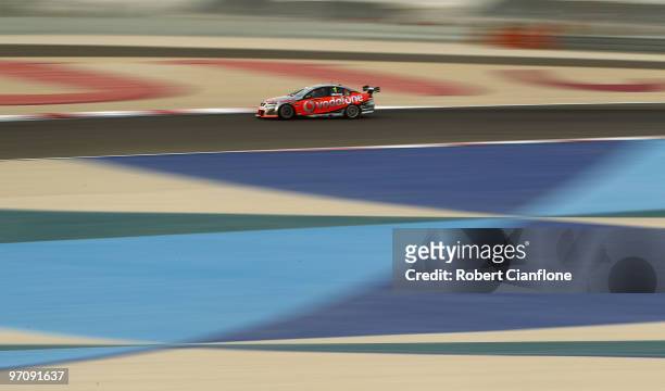 Jamie Whincup drives the Team Vodafone Holden during race one for round two of the V8 Supercar Championship Series at Bahrain International Circuit...