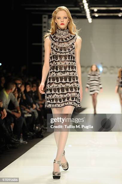 Model walks the runway during the RoccoBarocco Milan Fashion Week Autumn/Winter 2010 show on February 26, 2010 in Milan, Italy.