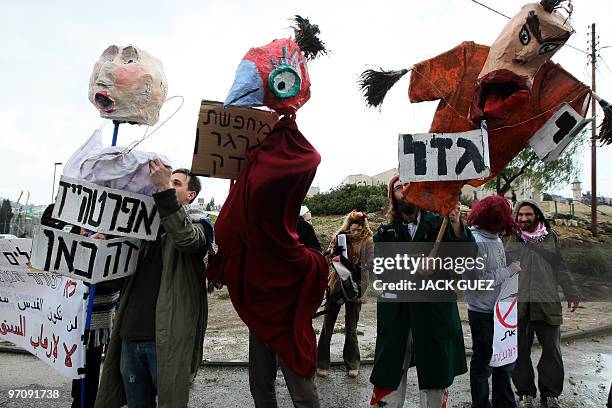 Left-wing Israelis, Palestinians and foreign peace activists demonstrate on February 26, 2010 in the mostly Arab Jerusalem neighborhood of Sheikh...