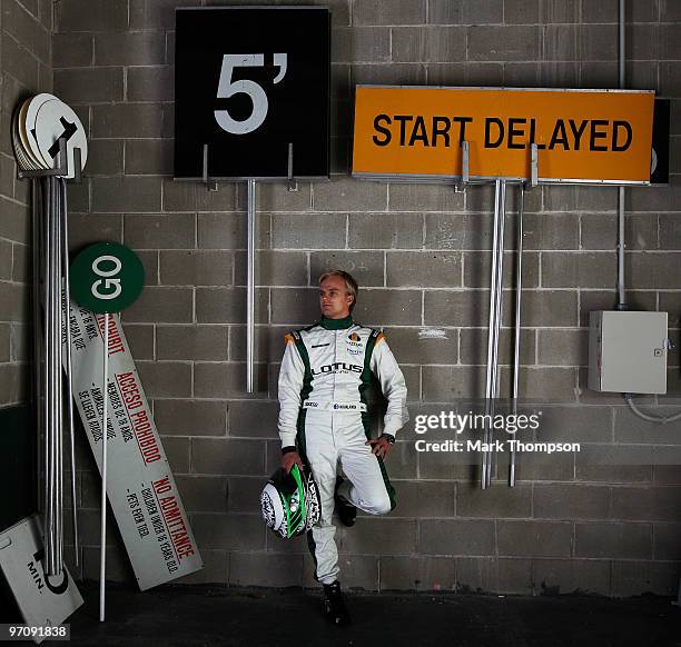 Heikki Kovalainen of Finland and Lotus poses for a photograph during Formula One winter testing at the Circuit De Catalunya on February 26, 2010 in...