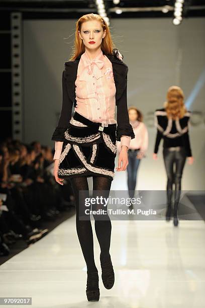 Model walks the runway during the RoccoBarocco Milan Fashion Week Autumn/Winter 2010 show on February 26, 2010 in Milan, Italy.