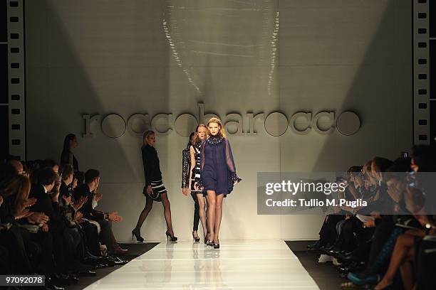 Models walk the runway during the RoccoBarocco Milan Fashion Week Autumn/Winter 2010 show on February 26, 2010 in Milan, Italy.