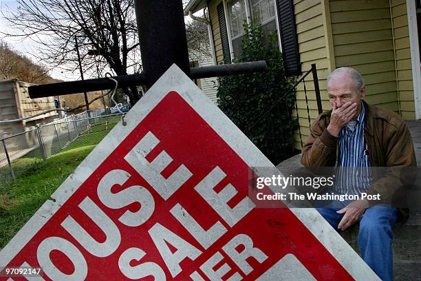 Photos by Michael Williamson NEG#162566 12/07/04 -- Pete Ramey covers his mouth and nose after coughing due to the dust kicked up from a passing...