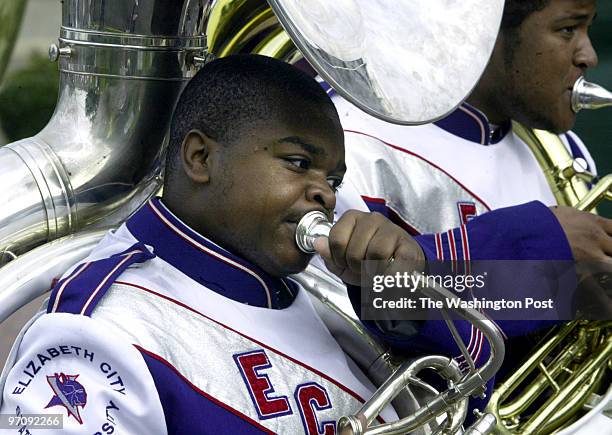 Pg-home14 10-09-04 Bowie, Md. Mark Gail_TWP A member of the Elizabeth City State University's marching band tuba section playing in the Bowie State...