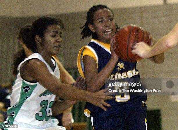 WJohnson8 Date: Kevin Clark\The Washington Post Neg #: 162603 Bethesda, MD Nalini Hawkins of Walter Johnson makes a pass with Bethesda Chevy Chase's...