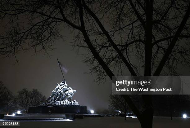 Neg#: 165247 Photog:Preston Keres/TWP Washington, D.C. Iwo Jima Memorial on the night of a quiet snow storm in the D.C. Area. The 60th anniversary of...