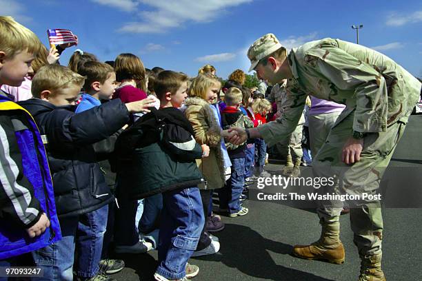 Feb 23, 2005 Slug: me/homecoming Neg. #: 165203 Photog: Gerald Martineau/TWP West Point, VA 276th Army Engineer Battalion returns from Iraq Captain...