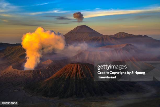 the beautiful volcanic landscape scene at the bromo-tengger-semeru national park during sunrise, east java, indonesia. - copyright by siripong kaewla iad stock pictures, royalty-free photos & images