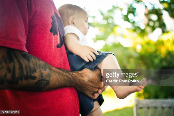 a father and his son. - genderblend2015 stock pictures, royalty-free photos & images